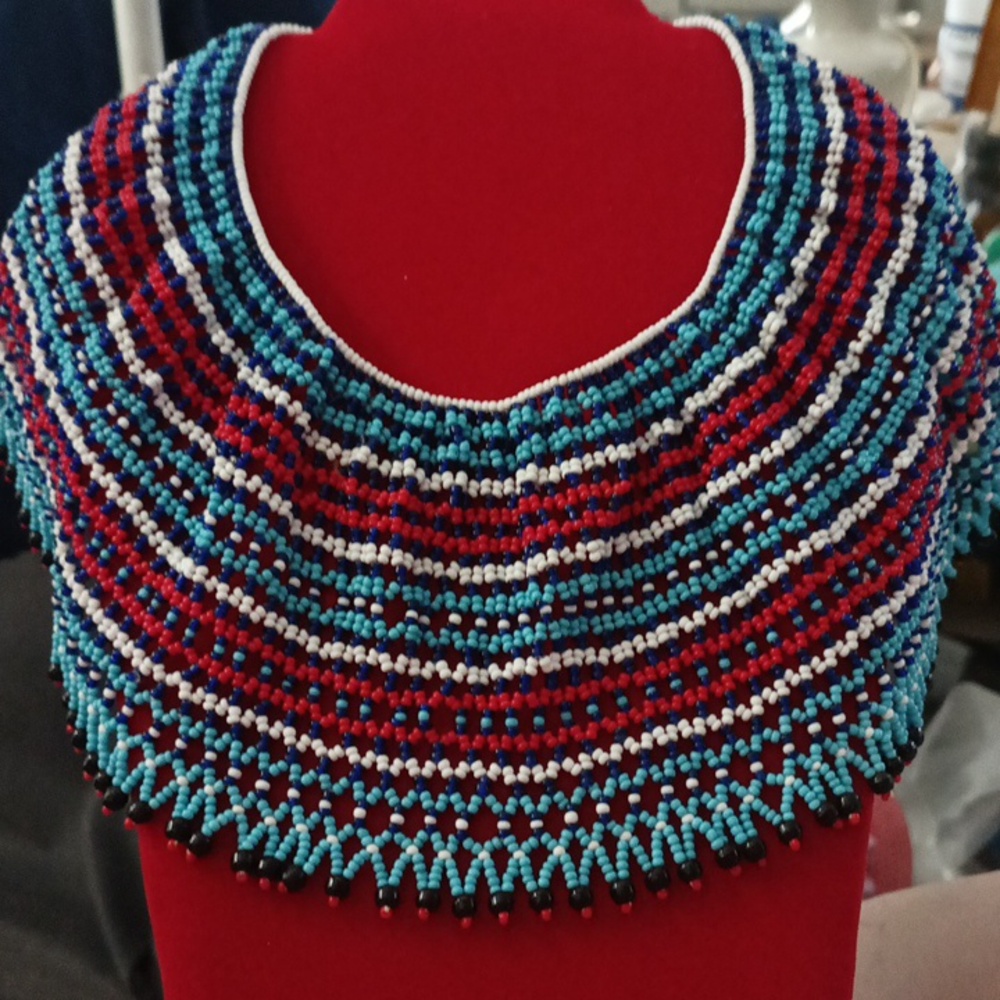 Collar (Ingqosha)ARTS OF AFRICAThis necklace would have been worn by a young m